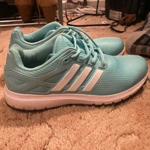 Light blue Adidas running shoes